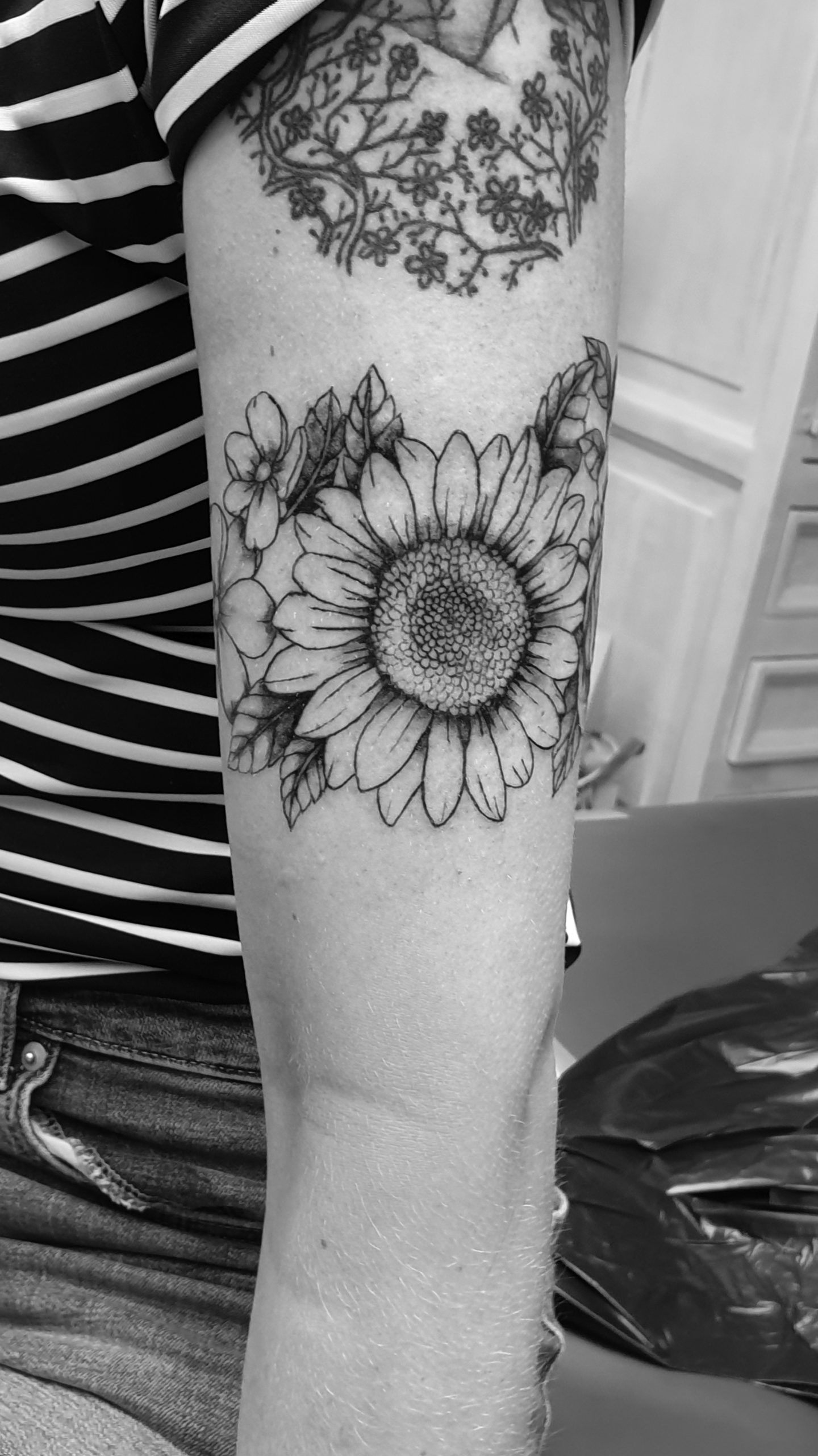 zonnebloem tattoo